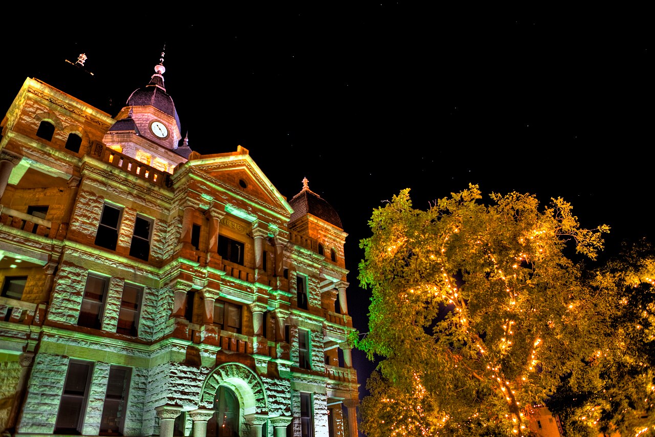 The Denton County Courthouse in Texas lit up at night